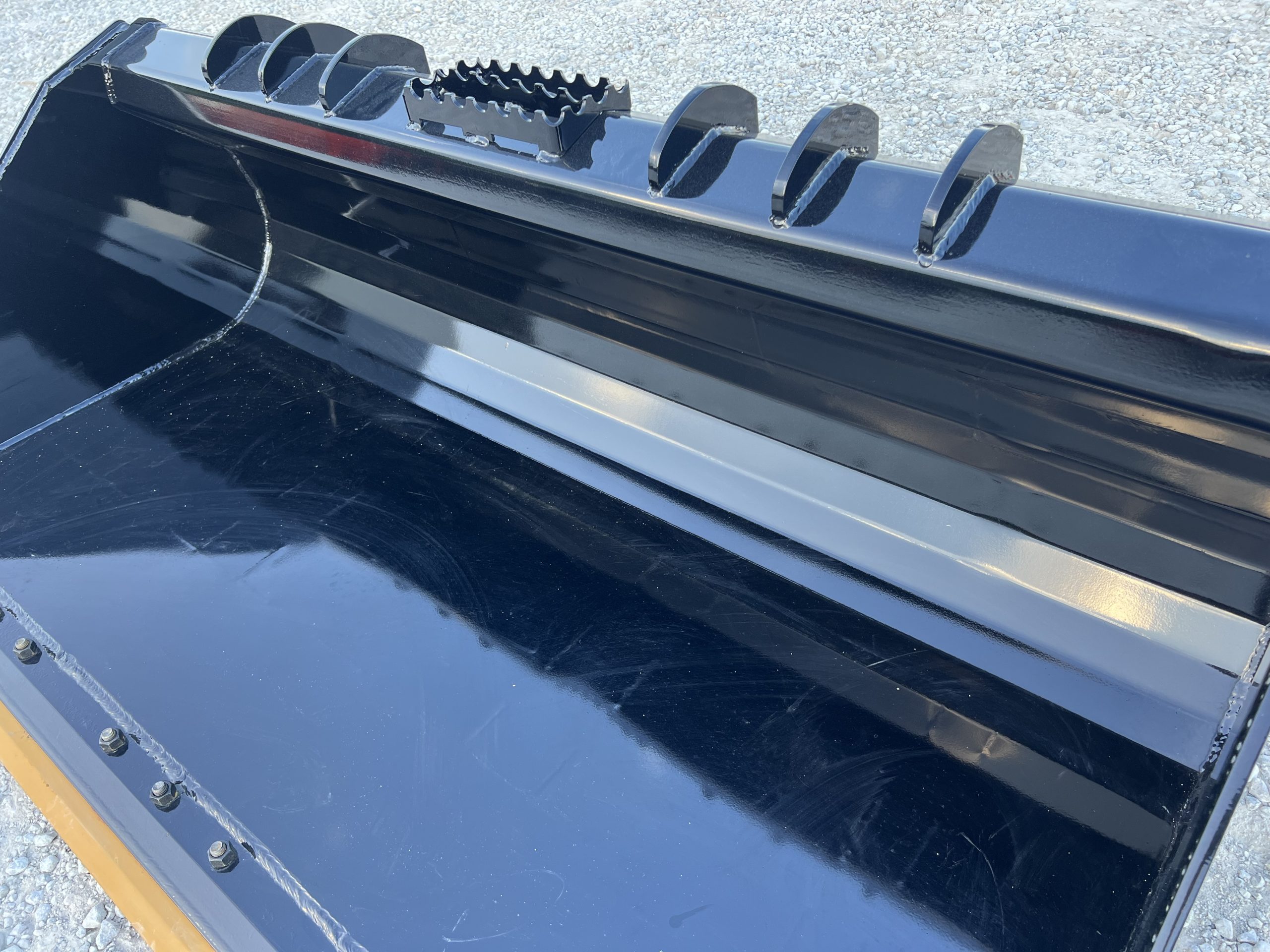 XHD 73″ Severe Duty Smooth Bucket with Bolt On Cutting Edge Fits Compact Track Loader - Image 10